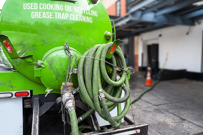 a pump truck emptying a grease trap in Walkertown, NC